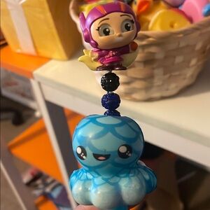 Vibrant Red Action Figure with Articulated Joints and Playset Accessories